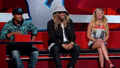 Three people sit on a red bench against a red and blue background.