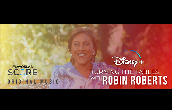 Robin Roberts smiling against a blurred background with Disney+ and Flavorlab Score text.