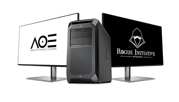 A black computer tower between two monitors displaying Area of Effect Studios and Rogue Initiative Studios logos.