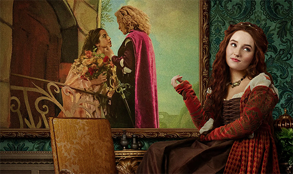 A woman in a red and brown gown sits before a large framed painting of a man and woman.