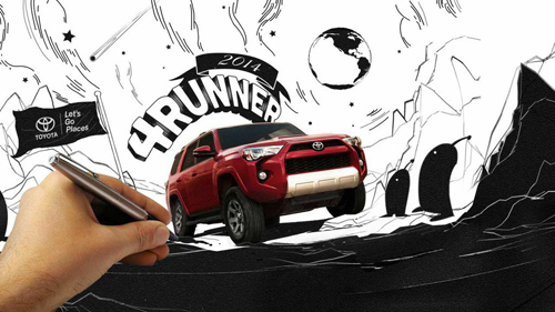A red toy Toyota 4Runner sits in a black and white sketch of mountains, stars, and a globe.