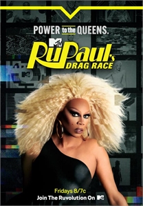 RuPaul with large blonde hair posing against a collage of television screens.