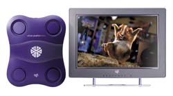 A purple handheld gaming controller sits beside a small television displaying a goat in a barn.