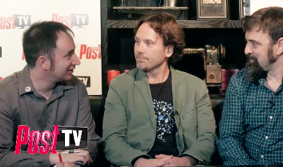 Three men seated in a studio, engaged in conversation with a Post TV logo in the foreground.