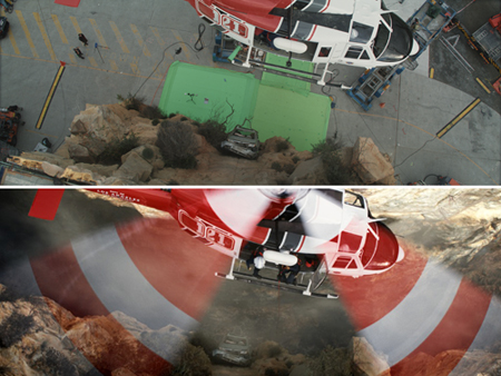 Top view of a red and white helicopter hovering over a rocky landscape with a green screen and a car.