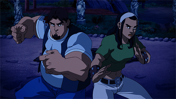 An animated man and woman in martial arts stances against a dark outdoor background.