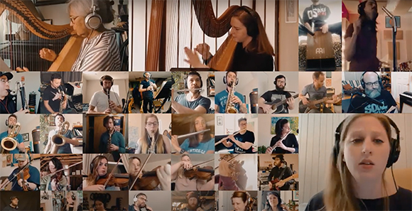 Grid of video call tiles featuring people playing harp, saxophone, flute, violin, and other instruments.
