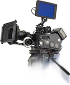 A professional cinema camera equipped with a large monitor, matte box, and various accessories on a tripod.