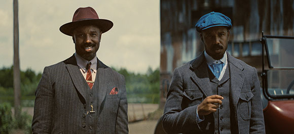 Two side-by-side portraits of a man wearing vintage suits and hats.