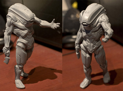 Two views of a grey, muscular humanoid figurine with a smooth, featureless head and an outstretched arm.