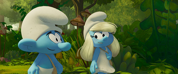 A blue male Smurf and a blue female Smurf with blonde hair stand in a green forest.