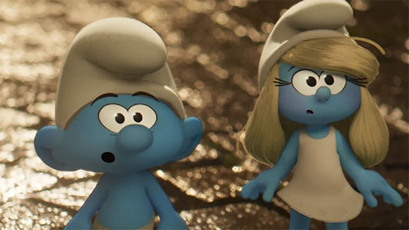 Two blue Smurfs with white hats looking ahead with wide eyes and surprised expressions.
