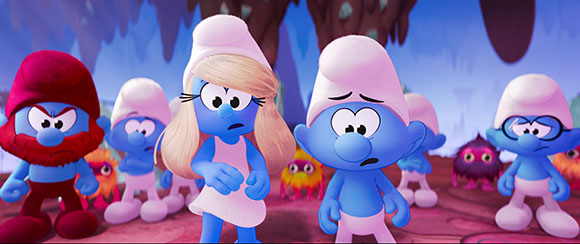 Several blue Smurf characters with various expressions of anger and worry standing in a colorful forest.