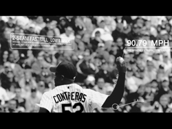 Black and white shot of a baseball pitcher throwing a 90.79 MPH 2-seam fastball toward a crowd.