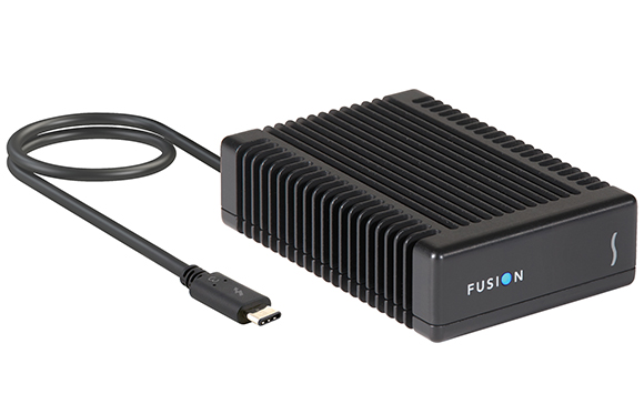 Black rectangular ribbed external hard drive enclosure with a connected USB-C cable.