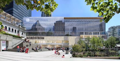 A large, multi-story Nordstrom building with glass facades and people walking in front.