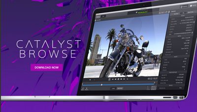 A laptop displays the Catalyst Browse interface showing a video of a motorcycle on a sunny street.
