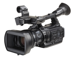 A professional black Sony video camera with a large lens, viewfinder, and various control buttons.