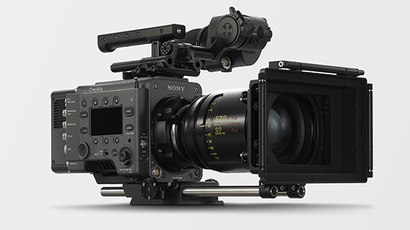 A black Sony CineAlta cinema camera equipped with a large lens, matte box, and top handle.