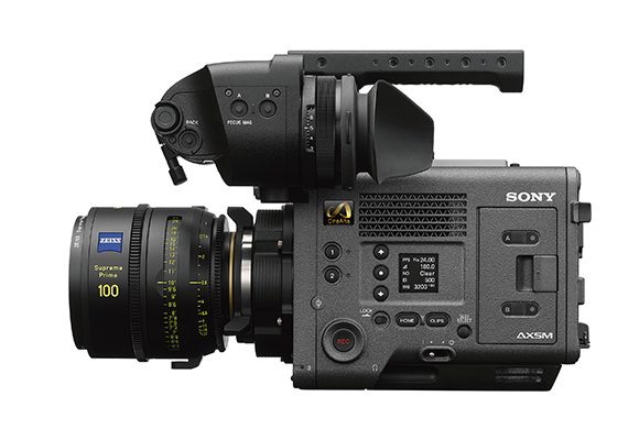 Side view of a Sony AXSM digital cinema camera equipped with a large Zeiss Supreme Prime 100mm lens.