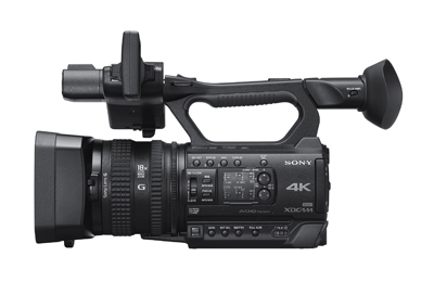 A black Sony 4K XDCAM professional video camera with a large lens and handgrip against a white background.
