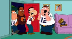 Four animated men in a living room wearing white and brown jerseys with the number 12.