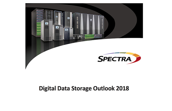 Various server racks and data storage hardware units arranged against a dark curved background.