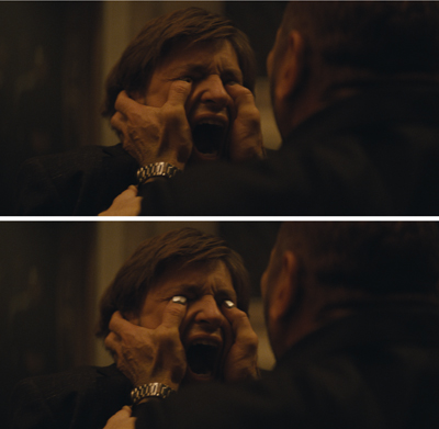 Two frames showing a man screaming while another person pulls his eyelids open.
