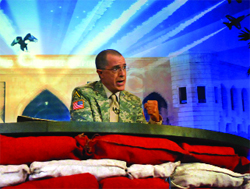 A man in camouflage uniform speaks behind red and white sandbags against a blue background.