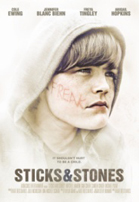 A young person in a white hoodie with the word 'FREAK' written in red on their cheek.