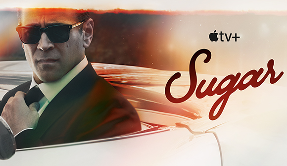 A man in a suit and sunglasses stands in front of a white car with the word Sugar and Apple TV+ logo.