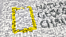 A 3D textured landscape of white cubes forming the National Geographic logo with a yellow rectangular border.