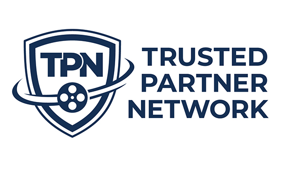 Logo for Trusted Partner Network featuring a shield icon with a film reel inside.