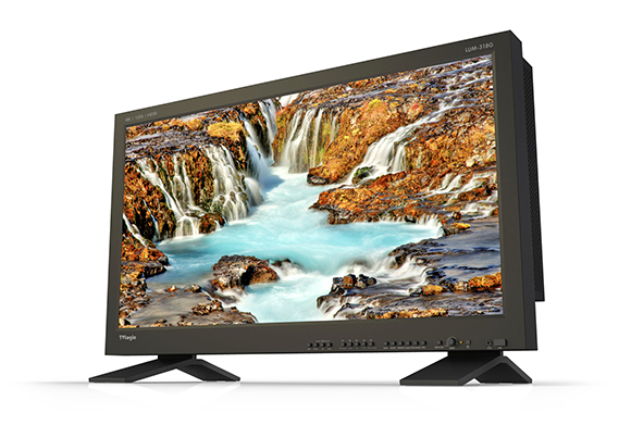 A black widescreen digital signage monitor displaying a high-resolution image of flowing waterfalls and blue water.