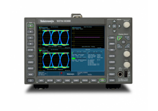 A Tektronix WFM 8300 oscilloscope displaying colorful waveform patterns on a digital screen.