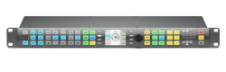 A gray rack-mountable video switcher with a central LCD screen, a large rotary knob, and numerous colored buttons arranged in
