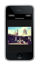 A smartphone screen showing a cross-processed landscape photo of a courtyard with domes and towers.