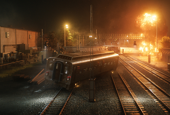 A train car sits on tracks at night next to a large, bright orange explosion in a rail yard.