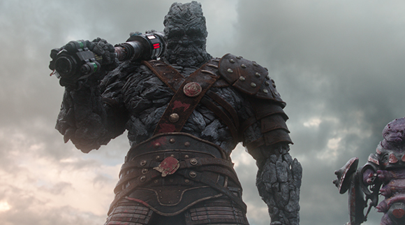 A massive, grey stone-textured humanoid wearing dark armor and holding a large mechanical weapon.