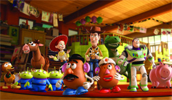 A group of animated toy characters including a cowboy, a space ranger, and various toys standing in a playroom.
