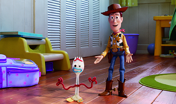 Woody the cowboy doll and Forky the spork toy stand on a wooden floor in a child's bedroom.