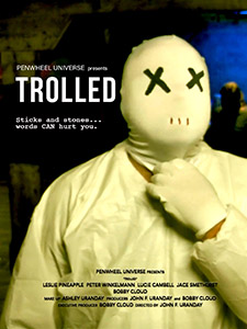 A person in a white hazmat suit wearing a white mask with black X eyes and a small slit mouth.
