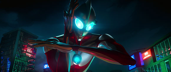 A giant silver and red humanoid figure poses in a dark city with glowing buildings.