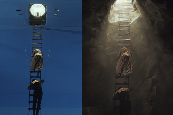 A person climbs a long ladder toward a bright light in a blue void and a dark cave.