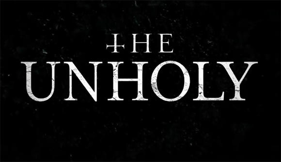 White distressed text reading 'THE UNHOLY' against a dark, textured black background.