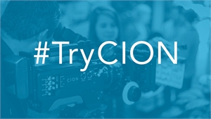 Blue-tinted image of a person operating a professional video camera with #TryCION text overlaid.