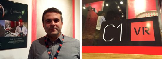 Man in a gray shirt with a lanyard stands next to a poster for "Factory Farm" and a sign with "C1 VR" on it.