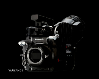 A black Panasonic Varicam 35 cinema camera viewed from the side against a black background.