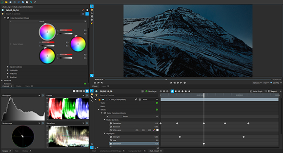 Video editing software interface showing color correction wheels, a timeline, and a snowy mountain landscape.