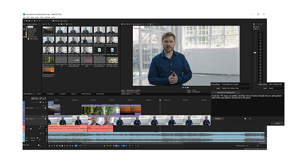 Video editing software interface displaying a man in a blue shirt on the preview monitor and clips on the timeline.